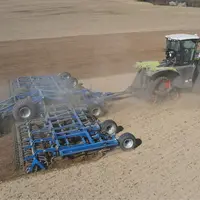 déchaumeur à dents Köckerling Allrounder Profilne 1270 avec Claas Xerion à quatre chenilles