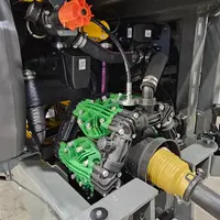 Pompe à pistons-membranes sur un pulvérisateur agricole