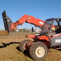 Le mini-profil 3D s'effectue à l’aide de fourches à palette sur un chargeur télescopique ou un chargeur frontal de tracteur.