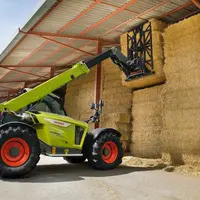 Chargeur télescopique Claas Scorpion à la manutention de balles de paille