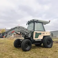 tracteur électrique compact Sabi Agri Volcam équipé d'un chargeur frontal MX