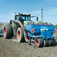 Trémie frontale Lemken Solitair F 2400 et tracteur Fendt