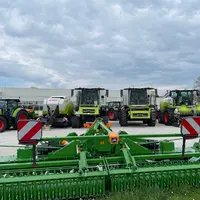 Concession Claas Mâcon avec Moissonneuse-batteuse Claas et herse rotative Amazone