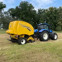 Presse à balles rondes New Holland Roll-Belt Plus et tracteur New Holland