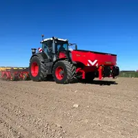 Trémie frontale FH 2200 et semoir monograine Tempo V de Vädersatd attelés sur un tracteur Fendt
