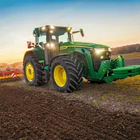 Tracteur John Deere 8R avec un déchaumeur à disques indépendants Väderstad Carrier