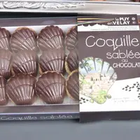 Les coquilles sablées au chocolat sont vendues en boîte de 18.