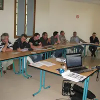 Les associés réunis en assemblée générale.