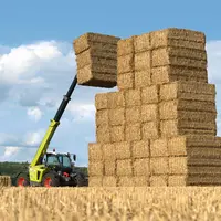Telescopique Claas avec bottes de paille