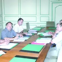 Jacky Guillon et Eric Mathe, à droite, attentifs aux propositions de la délégation.