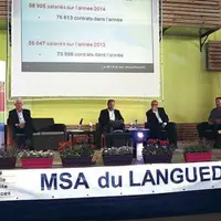 Au pupitre, le directeur François Donnay, présente différents bilans du fonctionnement de la caisse.