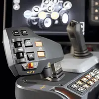 L'accoudoir SmartTouch des tracteurs Valtra profite d'un joystick privilégiant la simplicité d'utilisation.