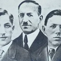 Portrait noir et blanc de trois hommes de la famille Mallet