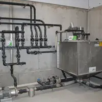 La soupe est préparée dans une cuve de 1 500 litres, dont la capacité a été calculée sur la base du plus petit repas nécessaire à l’élevage. © D. Poil