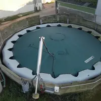 La couverture flottante Nénufar installée sur la fosse à lisier de 450 m3, permet de produire un biogaz qui sert à chauffer le bâtiment de post-sevrag