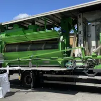 Machine de prestation de tri et de traitement de semences à la ferme.