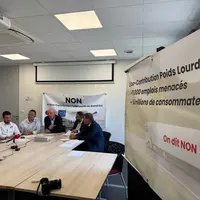 Lors de la conférence de presse du collectif Non à l'écocontribution poids lourds, le 25 août 2026