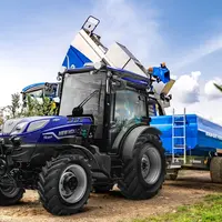 Tracteur New Holland T4.120.F AutoCommand et benne à vendange et machine à vendanger