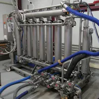 Filtre tangentiel à la cave coopérative de Tutiac, en Gironde. Permet de filtrer notamment les bourbes. Filtre de chez Bucher