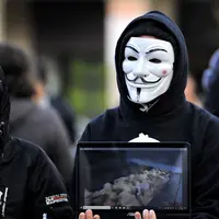 Happening d'Anonymous for the Coiceless. D'origine australienne, ce mouvement spécialisé dans l'activisme de rue milite pour l'abolitionnisme et le vé