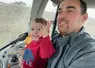 L'éleveur Nicolas Perrier avec son fils dans le tracteur.