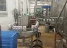 Les briques de lait Gérentes sur la chaine de production.