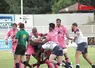Des joueurs en train de jouer au rugby.