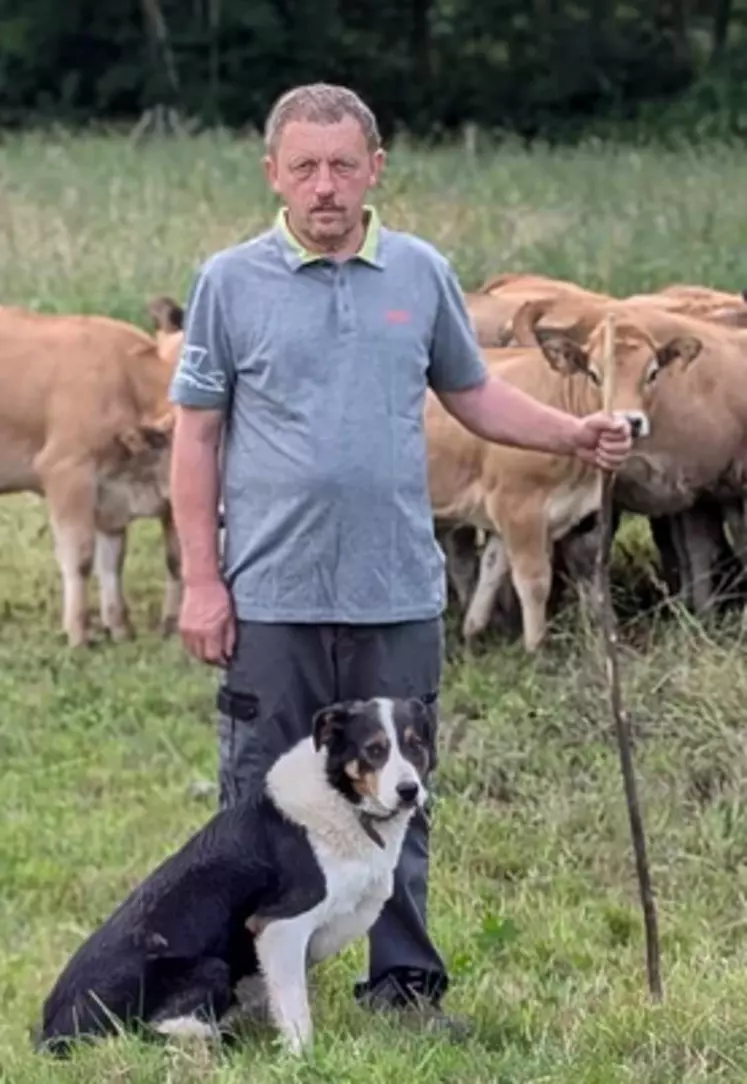 éleveur d'aubrac avec son chien