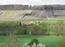   Paysage avec des parcelles de grandes cultures et de vignes  