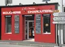 façade d'une boucherie charcuterie en zone