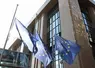 Drapeaux européens devant le bâtiment du Conseil de l'UE à Bruxelles. 