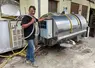 <em class="placeholder">Auguste Klein, vigneron, avec son tank à lait.</em>