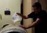 <em class="placeholder">Salarie d une exploitation viticole de Champagne mettant a niveau le remplissage de futs de chene avec le jus de la cuvee durant les vendanges 2020 en Champagne.</em>