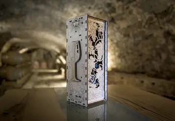 <em class="placeholder">La boîte Œnologic peut rendre la dégustation d&#039;un vin très ludique puisque les convives doivent d&#039;abord réussir à accéder à la bouteille.</em>